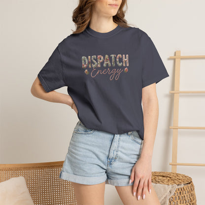 Person wearing a NAVY BLUE t-shirt with 'DISPATCH ENERGY' text and denim shorts indoors.