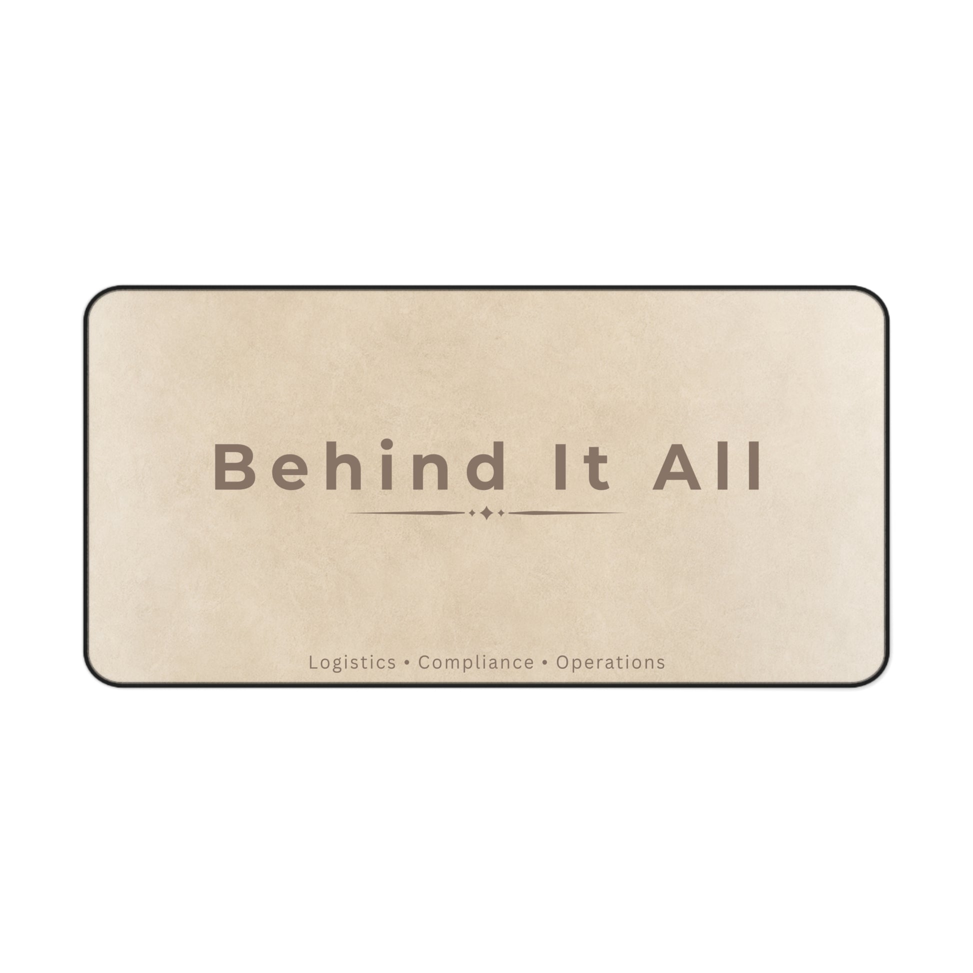 Beige mat with 'Behind It All' text on a white background