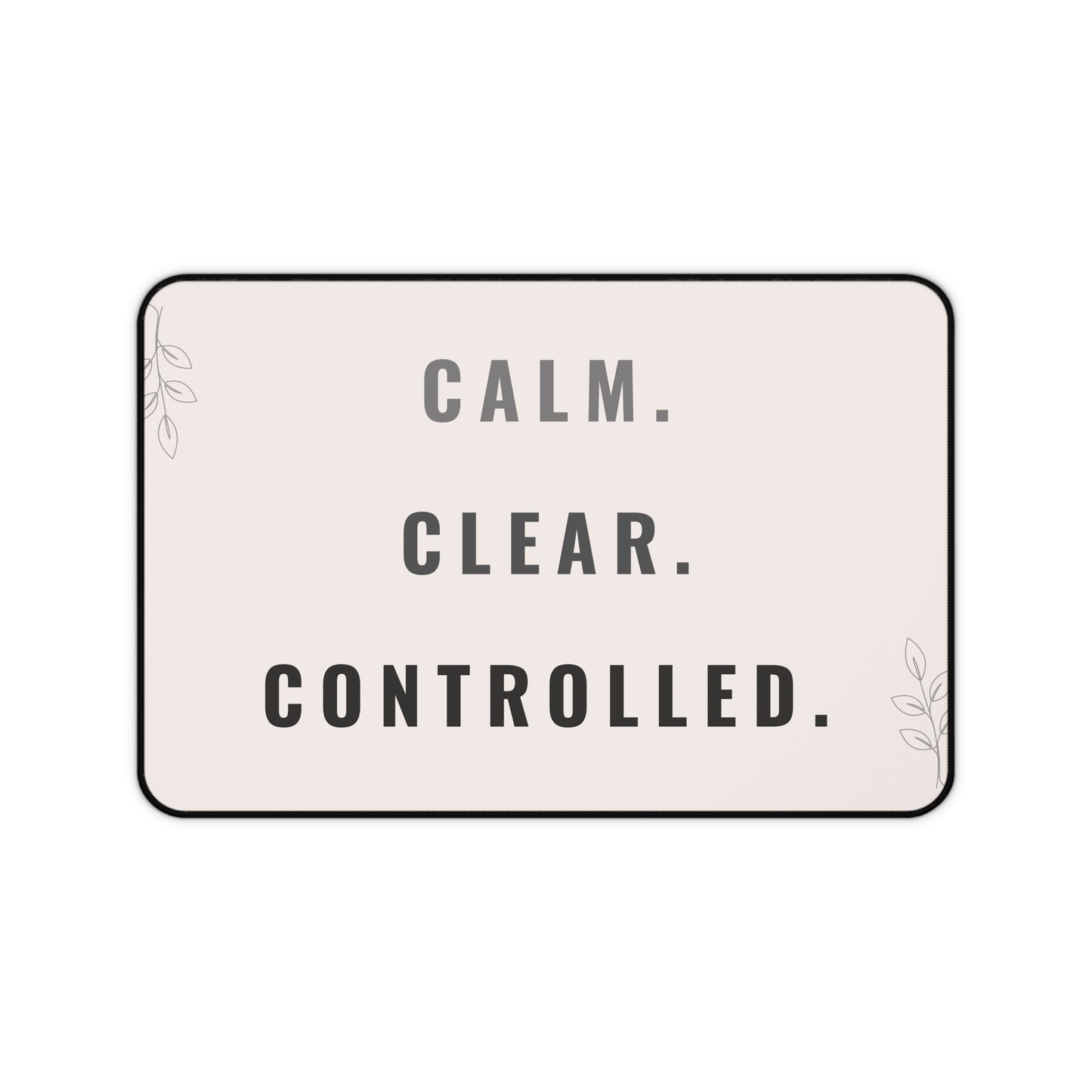 Decorative mat with 'CALM. CLEAR. CONTROLLED.' text on a light pink background