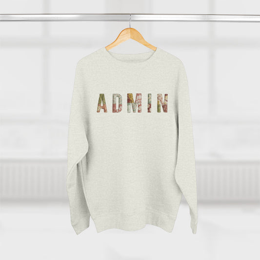 White sweater with 'ADMIN' printed on it hanging on a wooden hanger against a white background