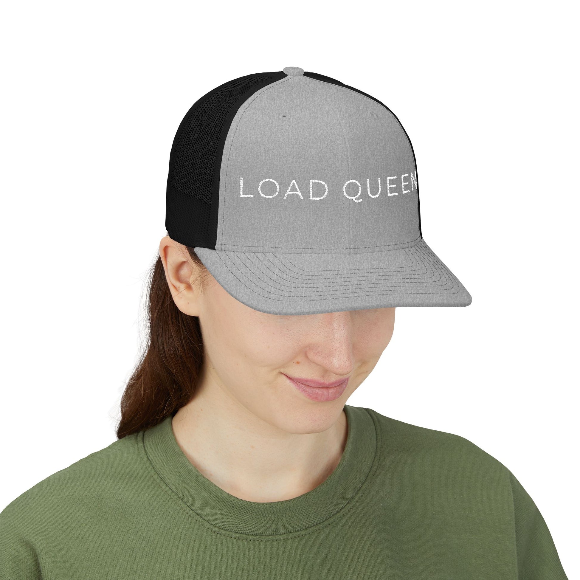 Person wearing a gray and black cap with text on a white background