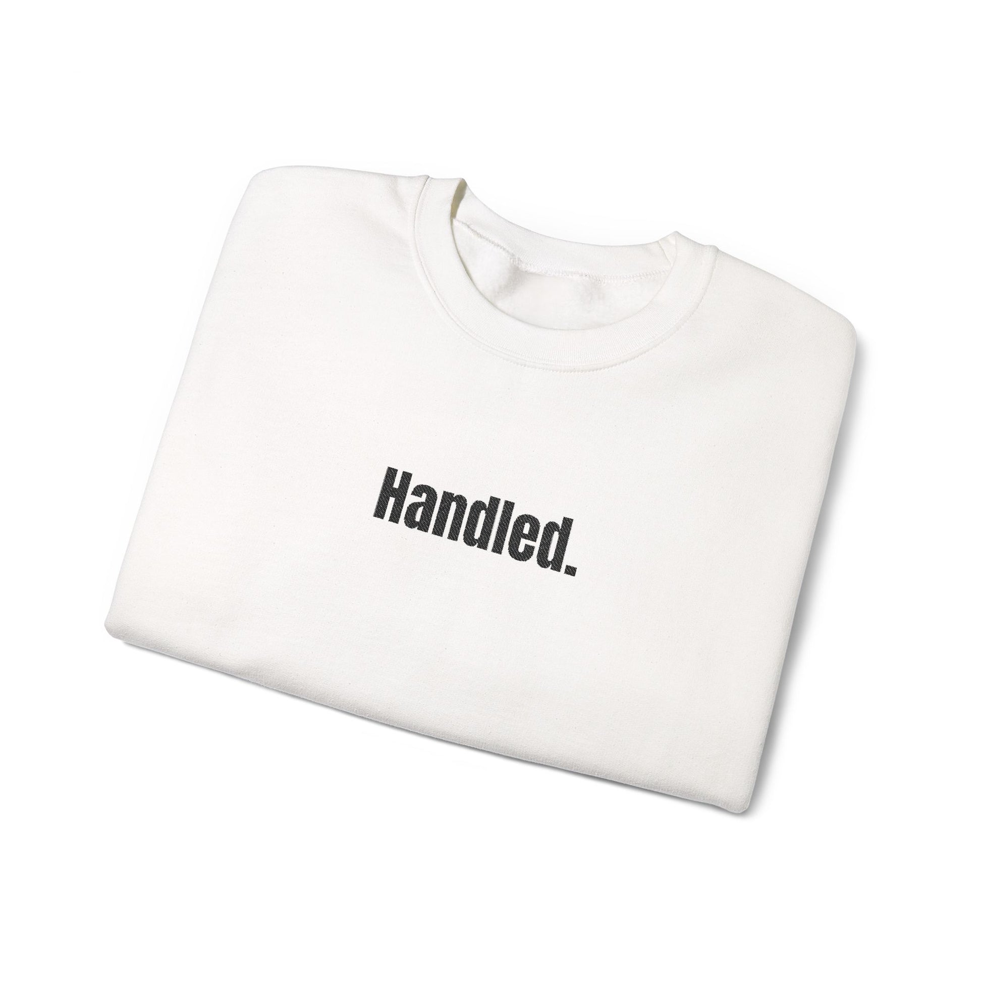 White sweatshirt with 'Handled.' text on a white background
