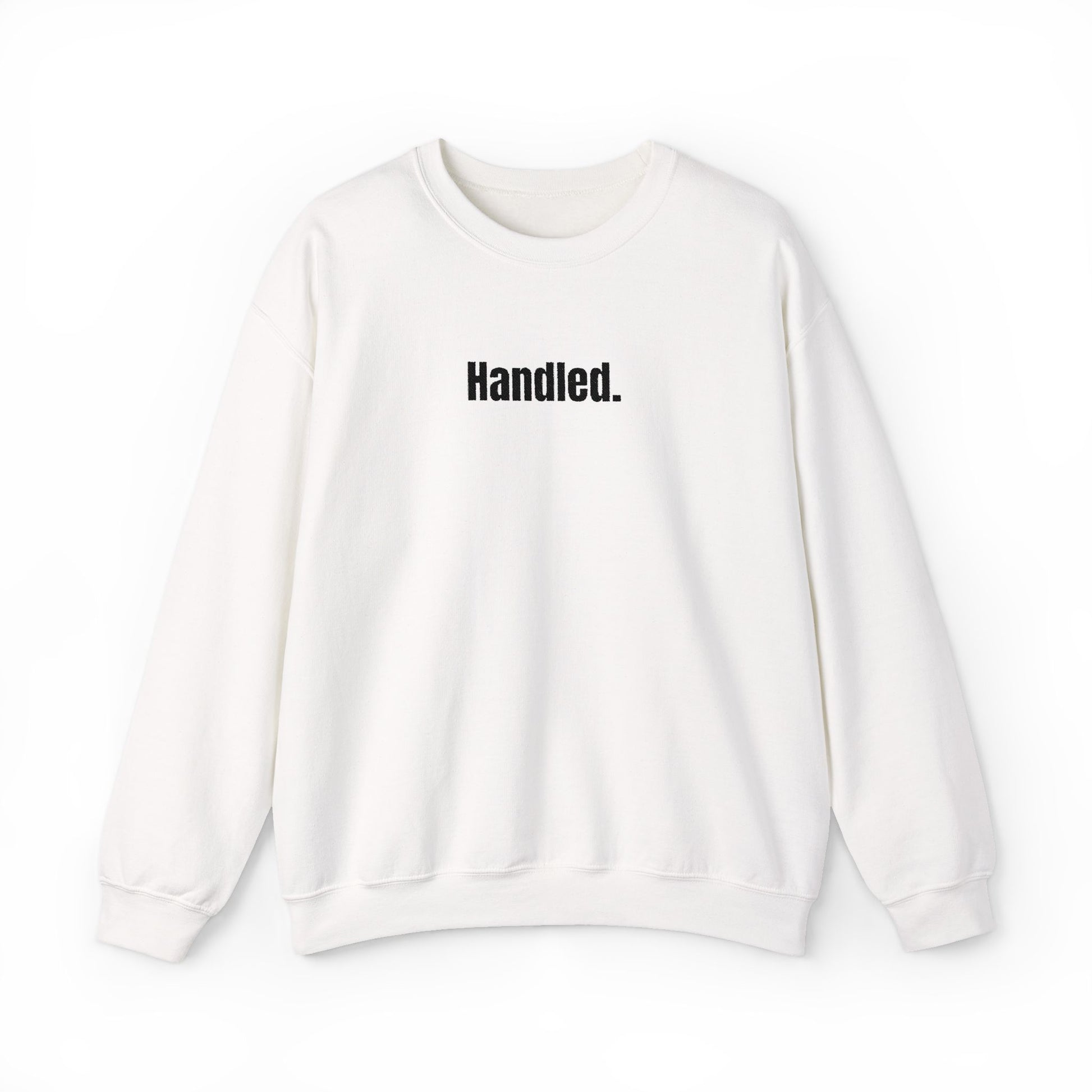 White sweatshirt with 'Handled.' text on a white background