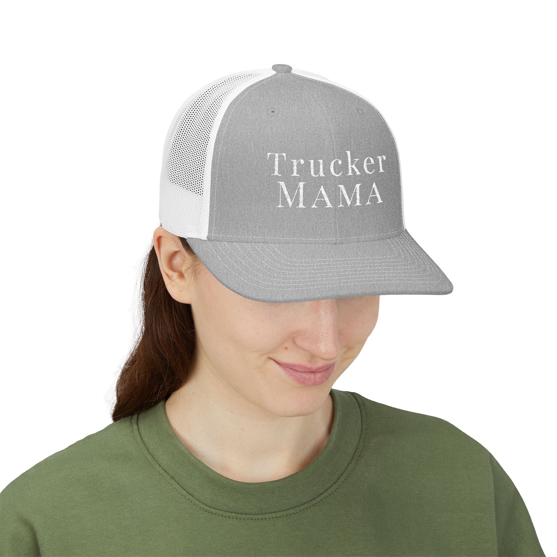 Person wearing a gray and white cap with 'Trucker MAMA' text on a white background