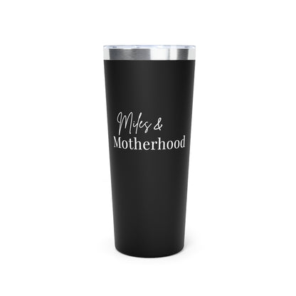 Black tumbler with 'Miles & Motherhood' text on a white background