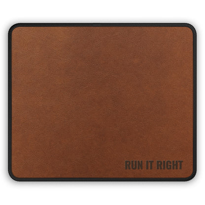Brown mouse pad with 'RUN IT RIGHT' text on a white background