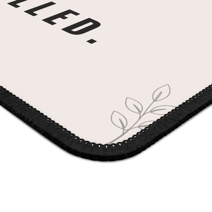 Corner of a product packaging with text and leaf design on a white background