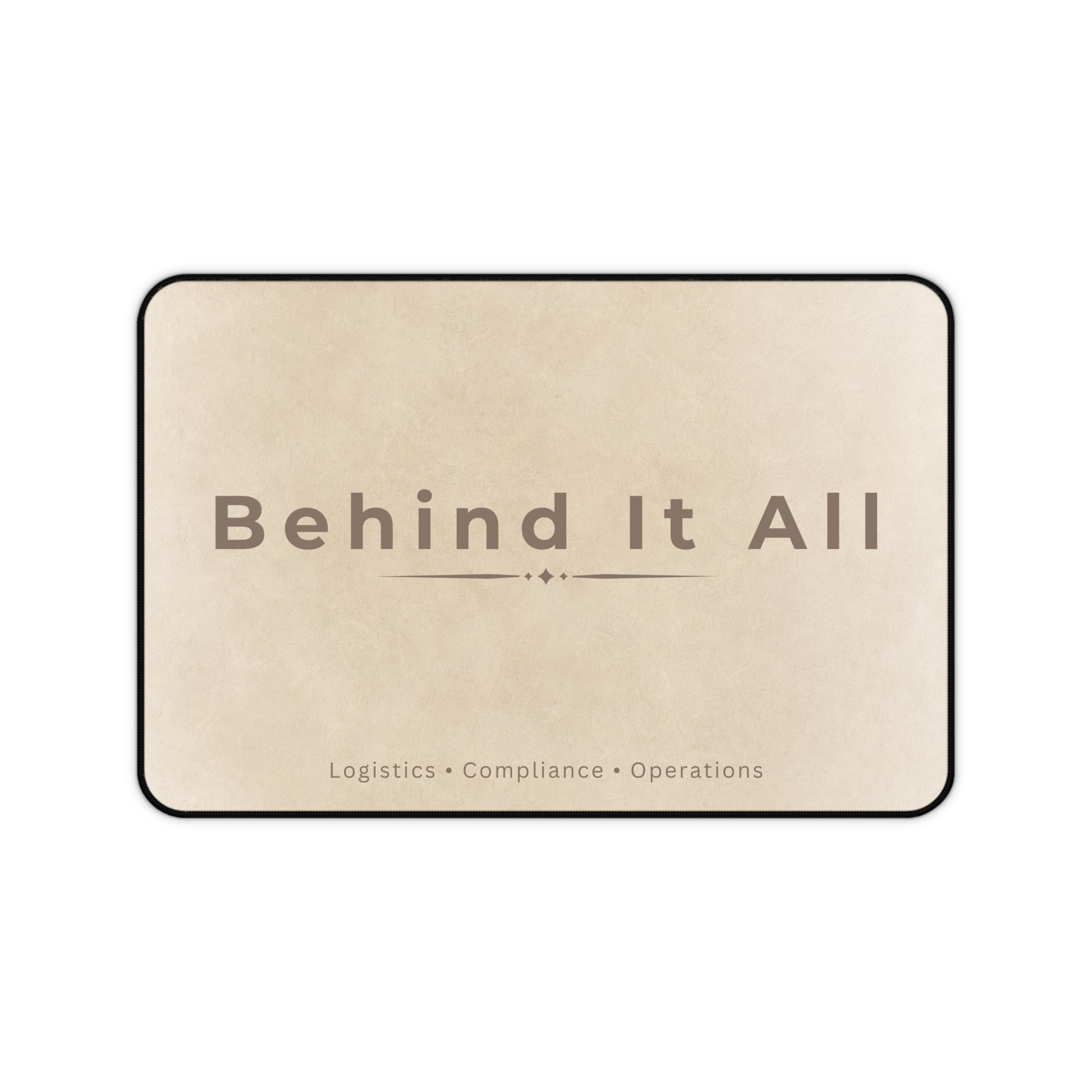 Beige mat with 'Behind It All' text on a white background