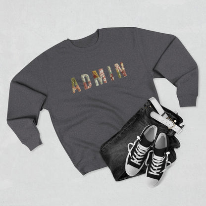 GREY SWEATSHIRT with 'ADMIN' text on a neutral surface with beige pants and decorative items.