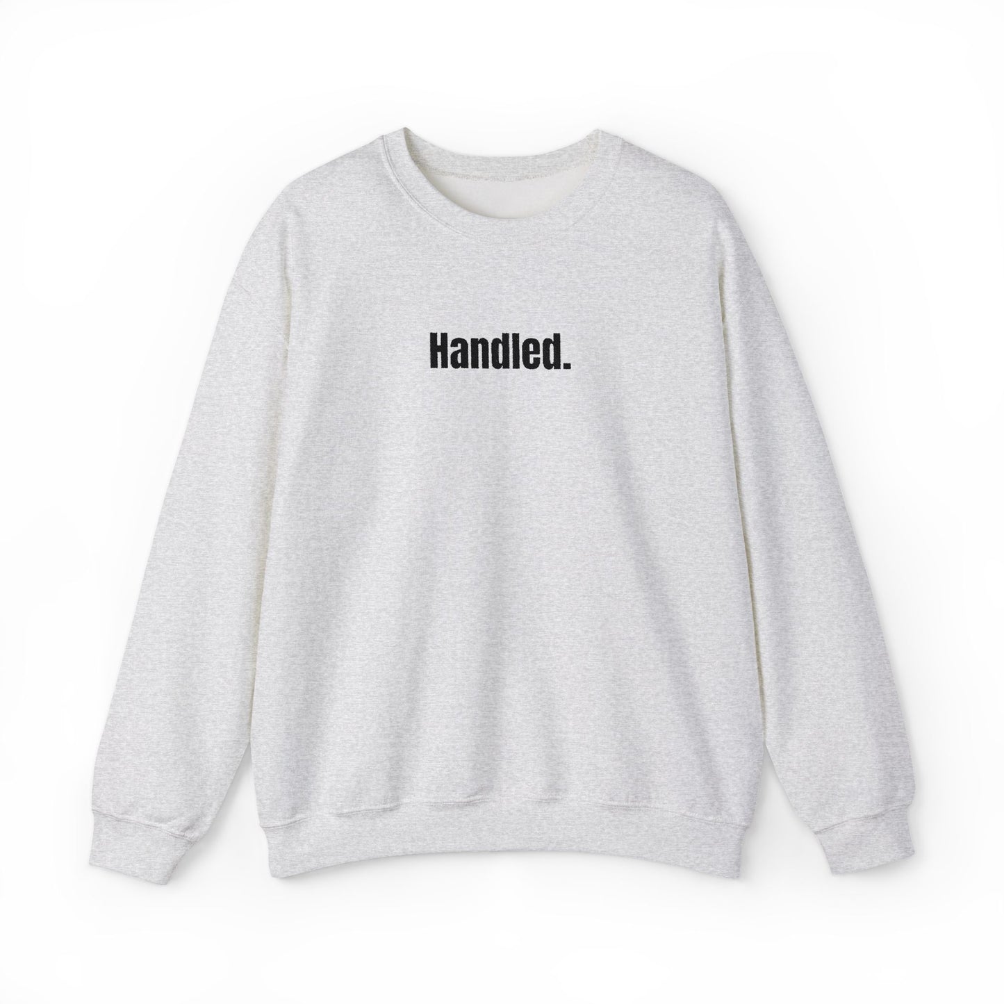 Gray sweatshirt with 'Handled.' text on a white background
