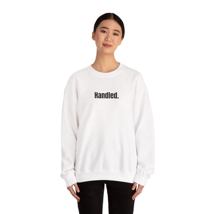 Person wearing a white sweatshirt with text on a white background