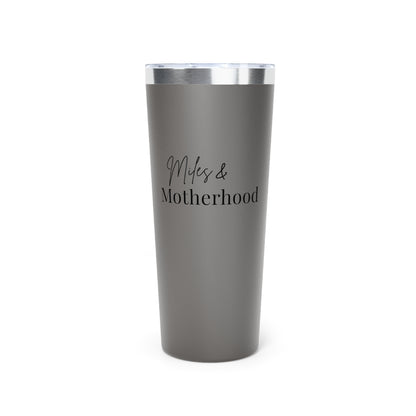Gray tumbler with 'Miles & Motherhood' text on a white background