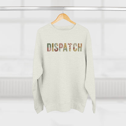 White sweater with 'DISPATCH' text on a hanger against a white background