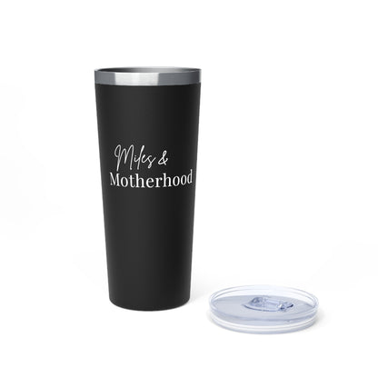 Black tumbler with 'Miles & Motherhood' text on a white background