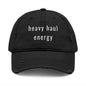 black cap with 'heavy haul energy' logo on a white background