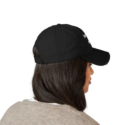 black cap with 'heavy haul energy' logo on a white background