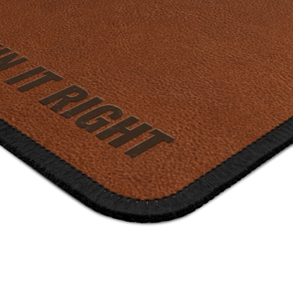 Brown leather mat with 'DO IT RIGHT' text on a white background