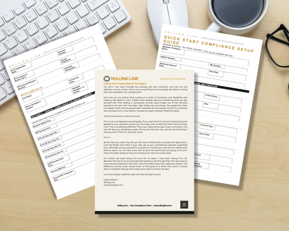 Quick start compliance setup guide on a desk with a keyboard and coffee cup.