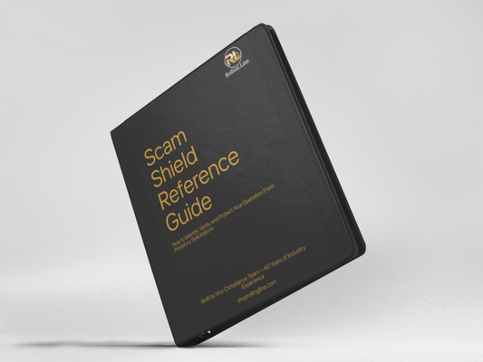 Black book titled 'Scam Shield Reference Guide' on a light gray background