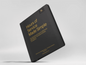 Black book titled 'Owner-Operator Tax Deductions Cheat Sheet' on a white background